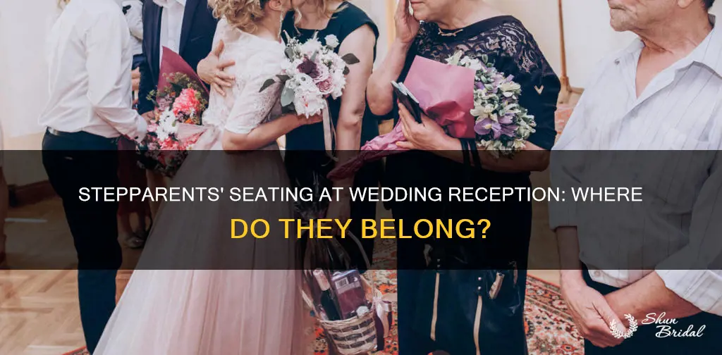 where do step parents sit at a wedding reception