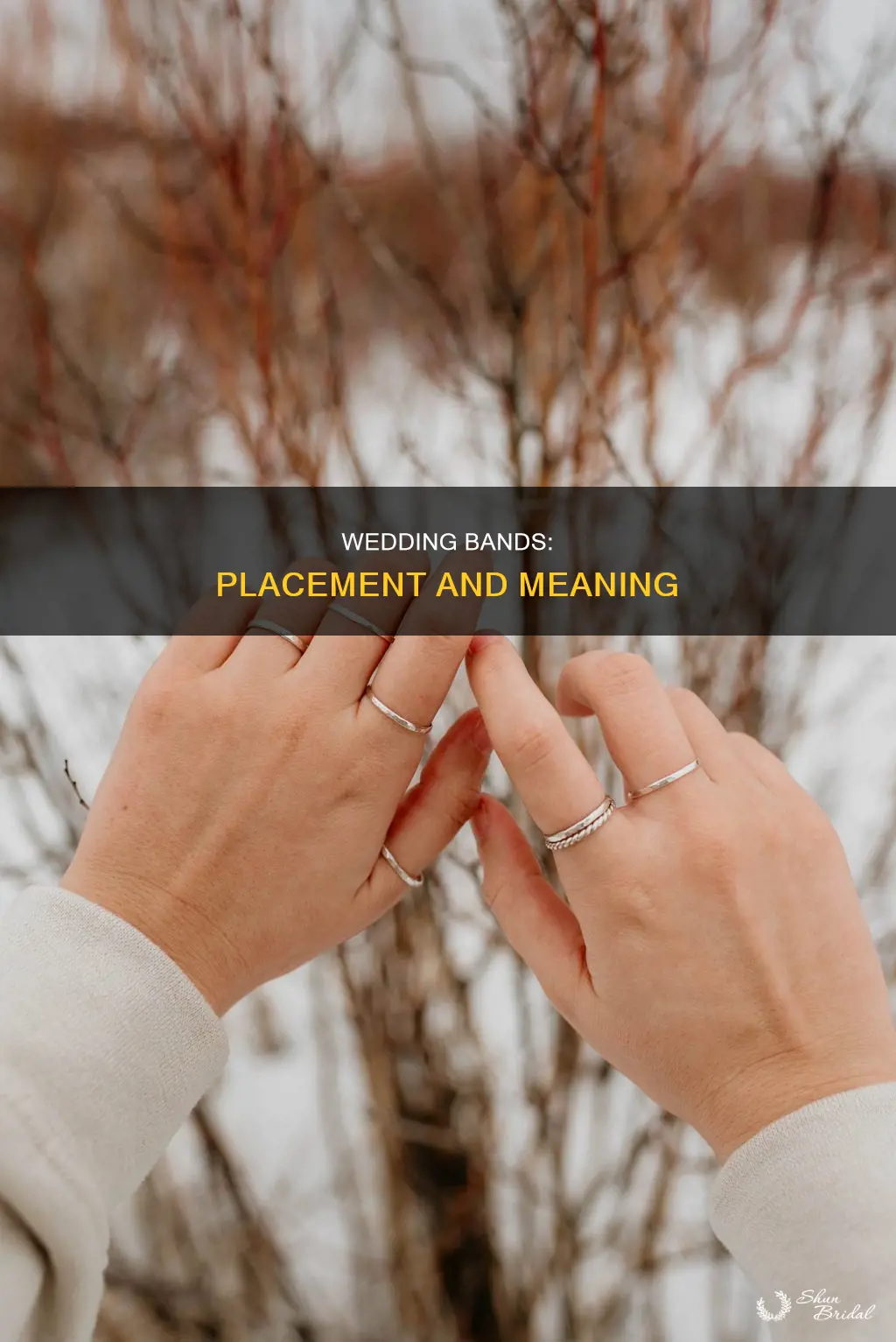 where does the wedding band go with the engagement ring