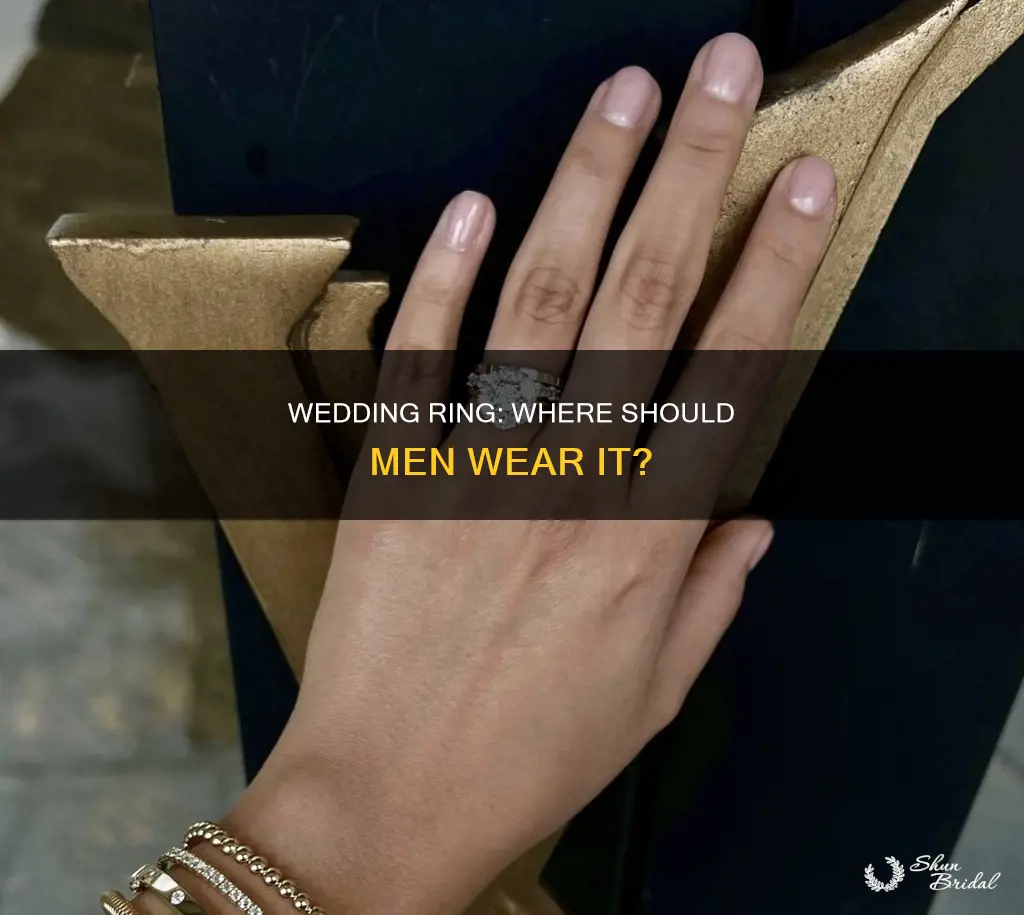 where should a wedding ring sit on a finger man