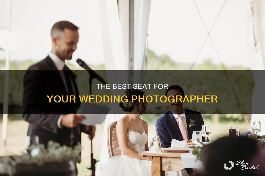 where to seat photographer at wedding reception