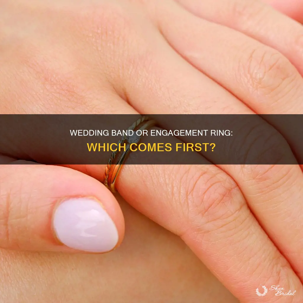 which one goes first wedding band or engagement ring