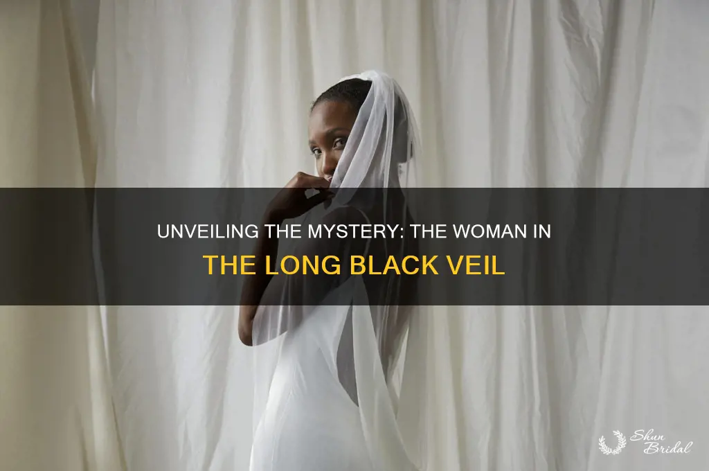 who is the woman in long black veil