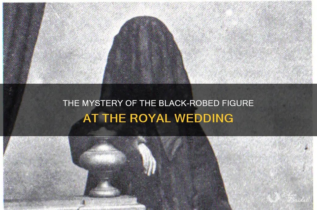 who was the person in black robe at royal wedding