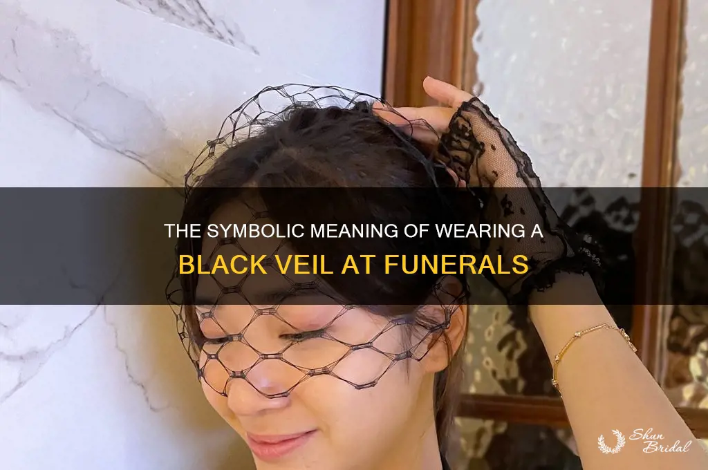who wears a black veil at a funeral