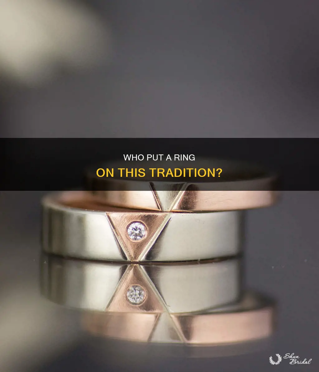 why are men expected to buy wedding rings