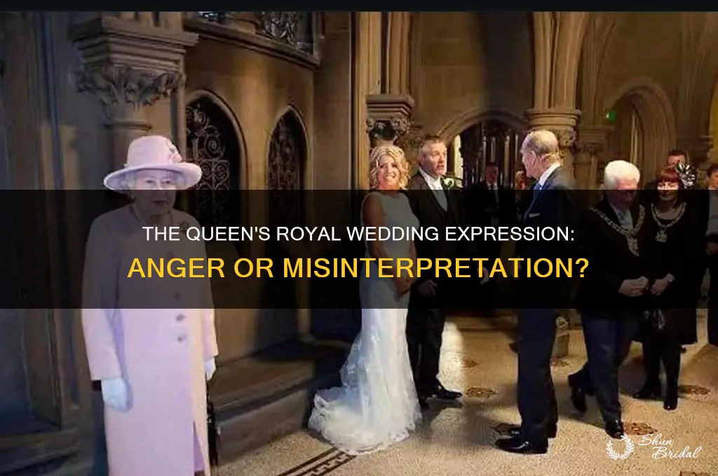 why did the queen look angry at the royal wedding