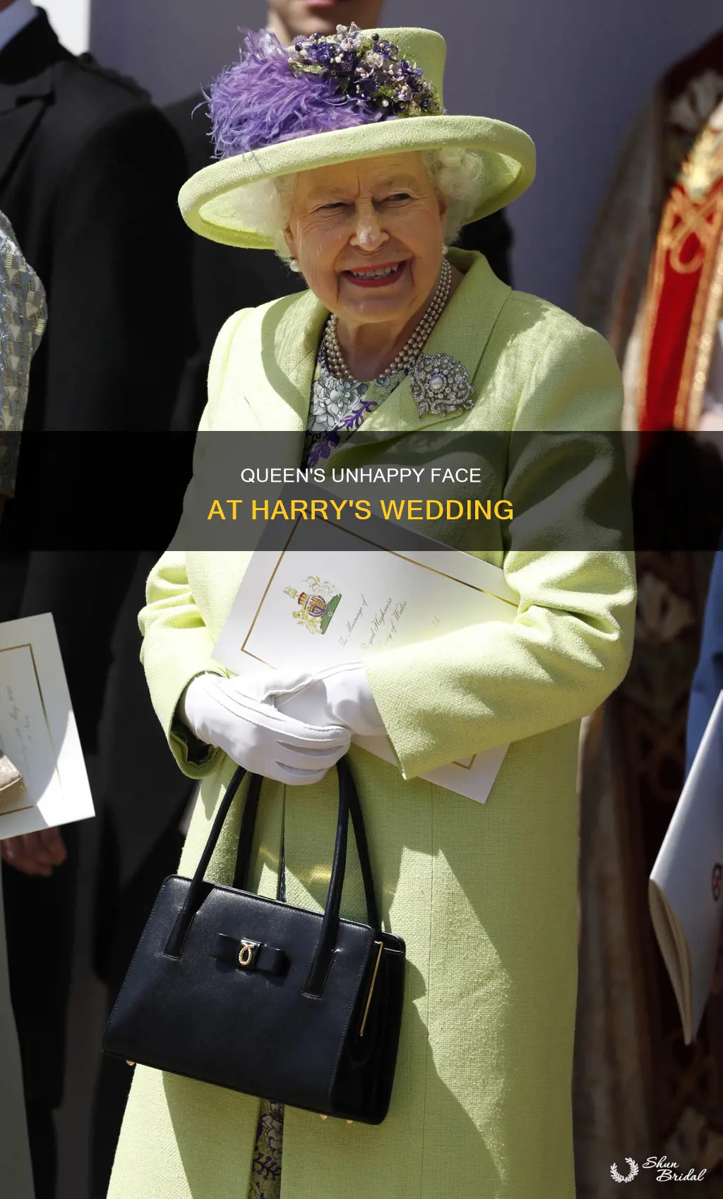 why didnt the queen look happy at harrys wedding