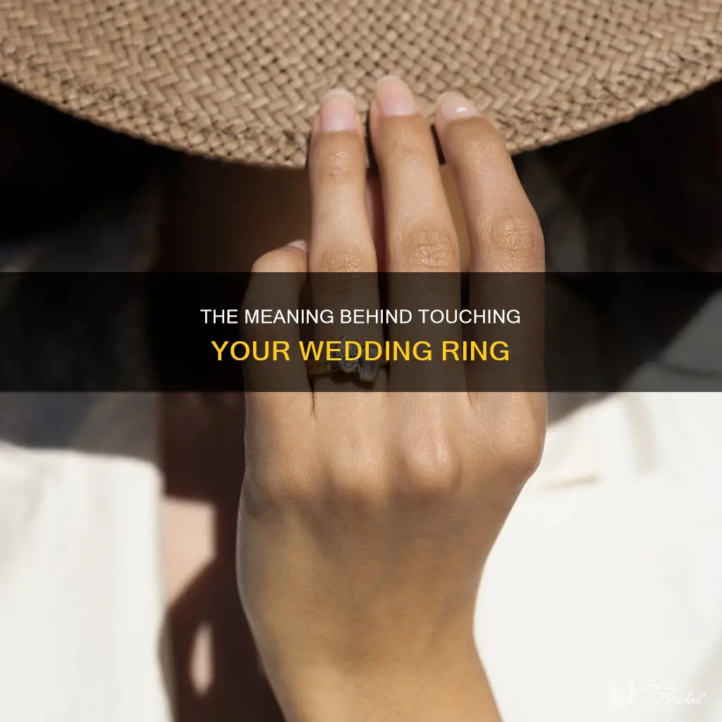 why does a person touch their own wedding ring