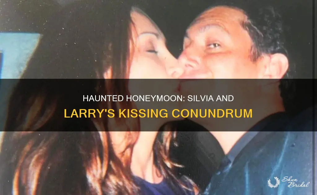 why is silvia kissing larry haunted honeymoon