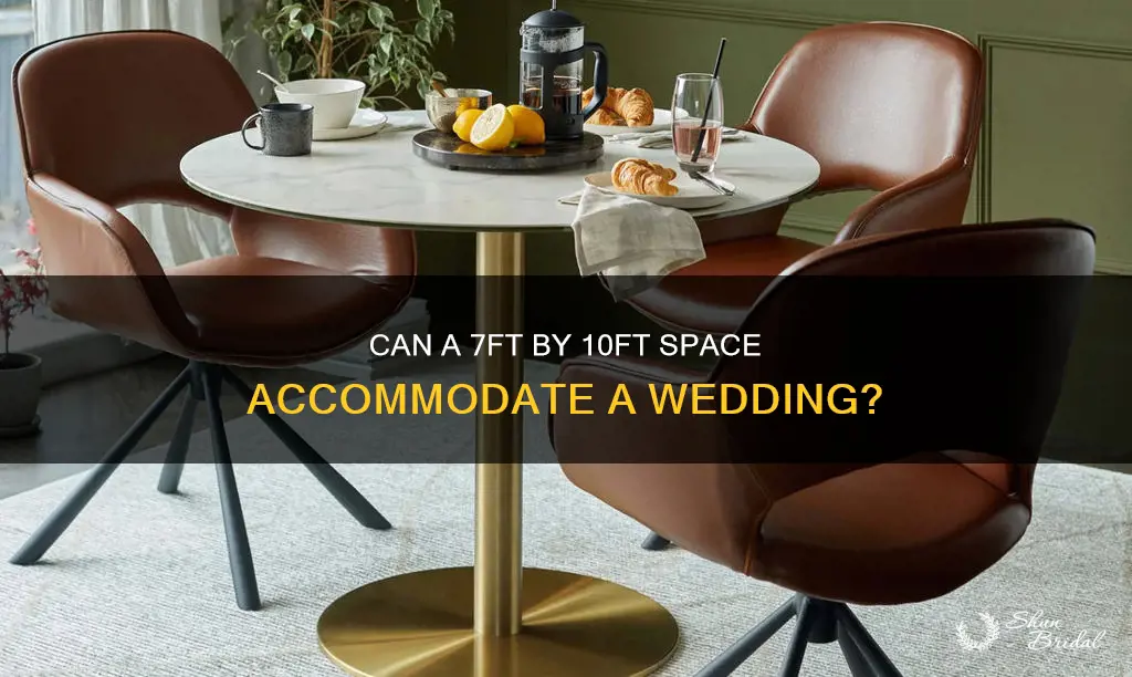 will a 7ftx10ft hold a 60 round table for wedding